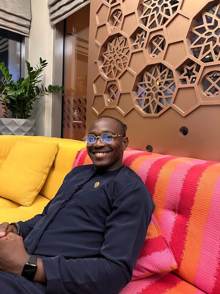 Wisdom K. King in a business lounge